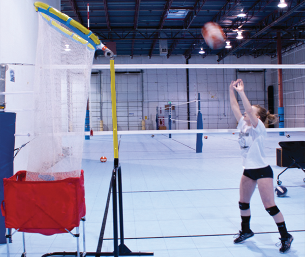 Girl setting volleyball in Precision Volleyball Trainer