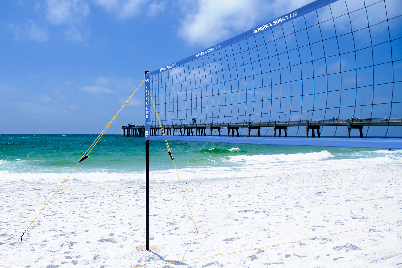 Volleyball ground stakes, equipment bags, guylines, and sand